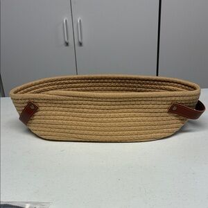 Tan Woven Basket with Brown Handles